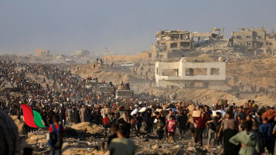 FILE PHOTO: Palestinians gather to receive aid supplies in Beit Lahia, in the northern Gaza Strip, June 16, 2025. REUTERS/Dawoud Abu Alkas/File Photo